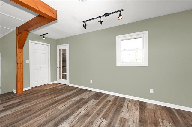 interior space with dark hardwood / wood-style flooring