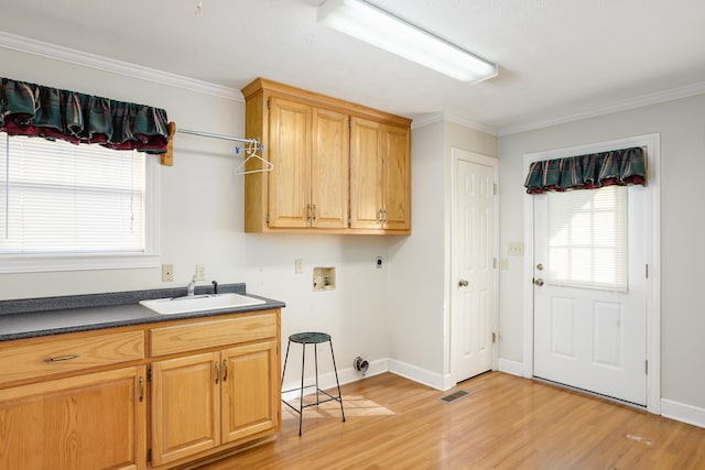 laundry room featuring sink, cabinets, electric dryer hookup, washer hookup, and light hardwood / wood-style floors