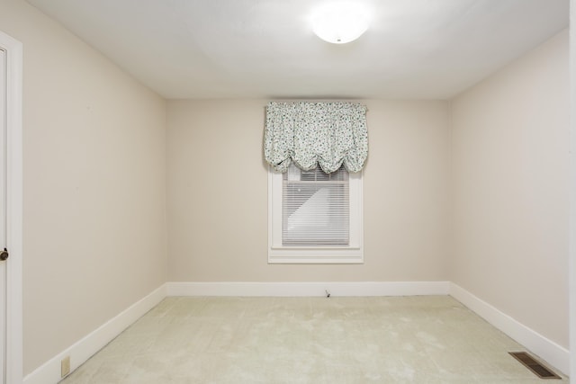 empty room featuring carpet flooring