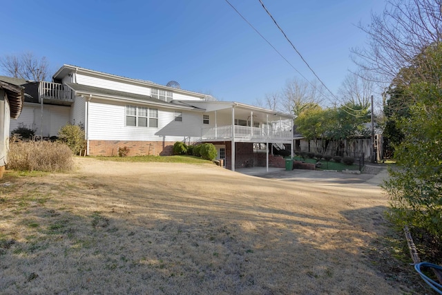 rear view of house with a carport