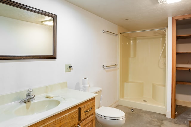 bathroom featuring walk in shower, vanity, toilet, and concrete floors