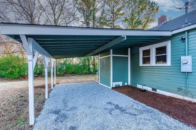 view of parking featuring a carport