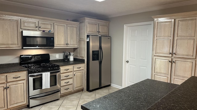 kitchen with appliances with stainless steel finishes, light brown cabinets, light tile patterned floors, and crown molding