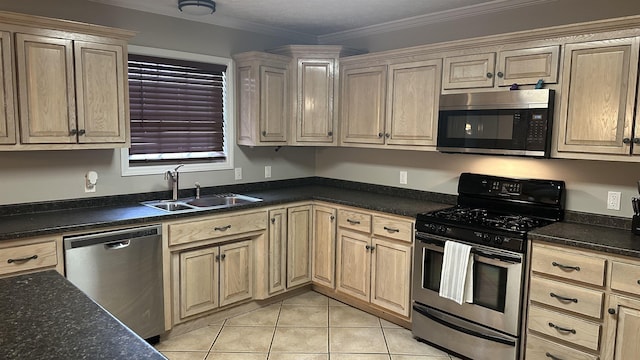 kitchen with light tile patterned flooring, sink, crown molding, and appliances with stainless steel finishes