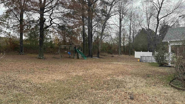 view of yard featuring a playground