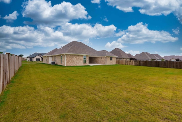 - fenced backyard with a patio area