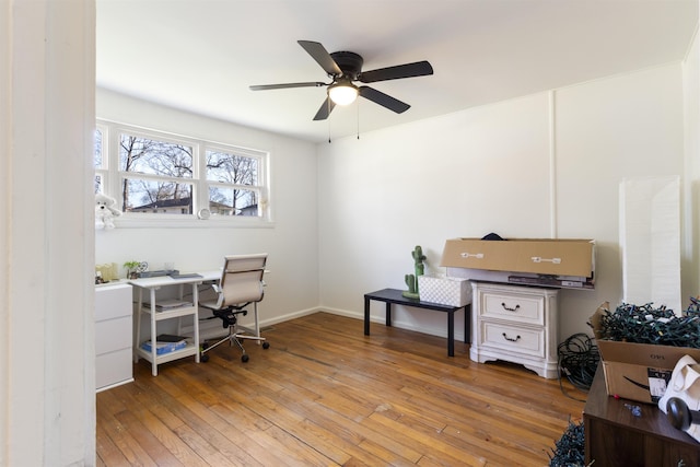 office featuring light wood-type flooring and ceiling fan