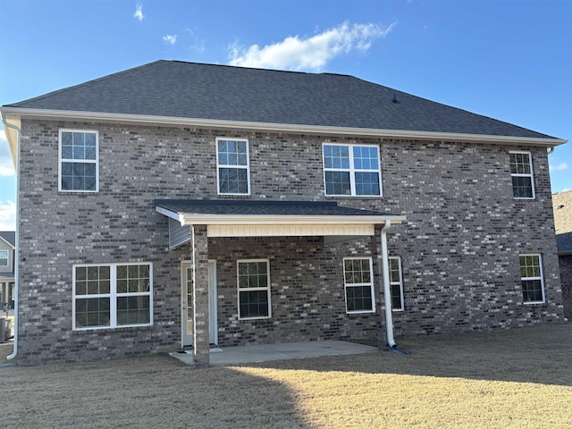 rear view of property with a patio area