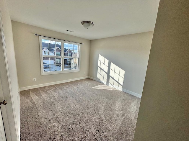 view of carpeted spare room