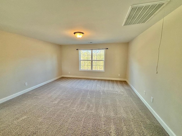 unfurnished room with carpet flooring