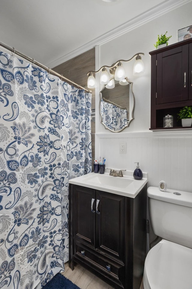  - full bathroom with vanity, crown molding, wood finished floors, and a shower with shower curtain