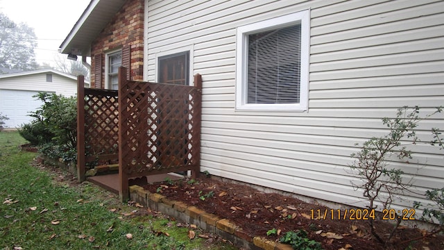 view of property exterior featuring an outdoor structure