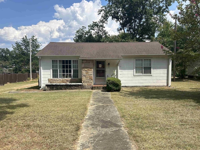 view of front of home with a front yard