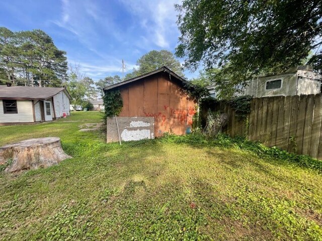  - view of yard with an outdoor structure
