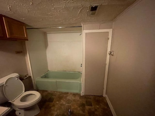  - bathroom featuring a tub, a textured ceiling, and a shower