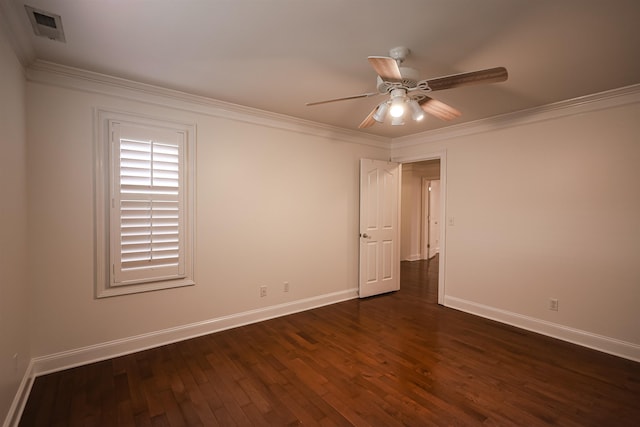 unfurnished room with ornamental molding, dark wood-style flooring, ceiling fan, and baseboards