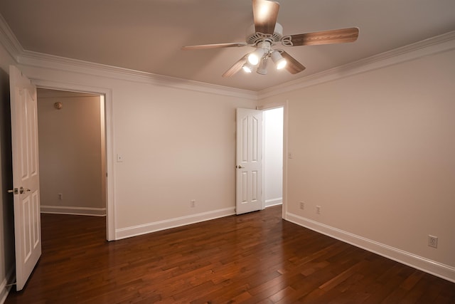 unfurnished room featuring baseboards, ceiling fan, dark wood-style flooring, and crown molding