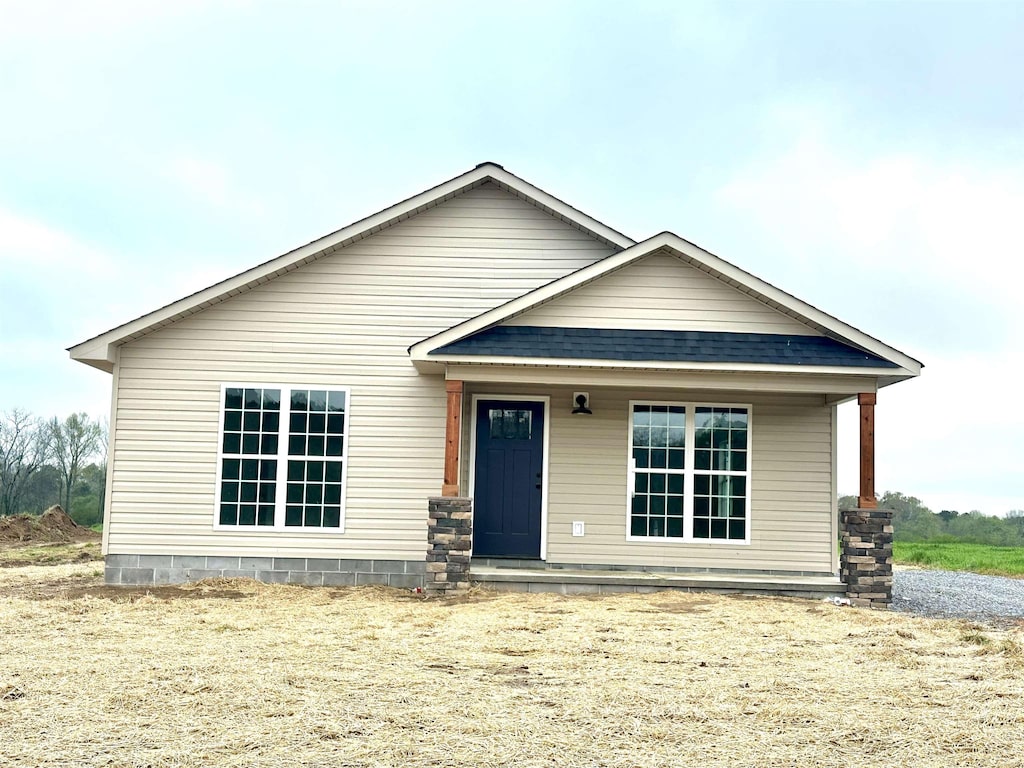  - view of front facade featuring covered porch