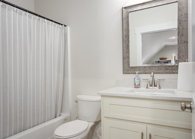 full bathroom with vanity, shower / bath combination with curtain, and toilet