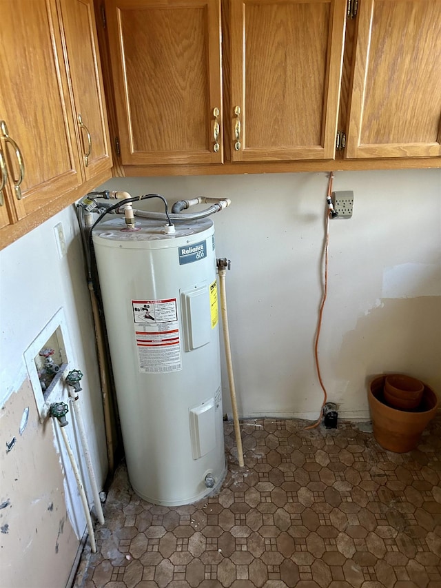 utility room featuring electric water heater