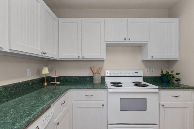 kitchen featuring white appliances and white cabinets