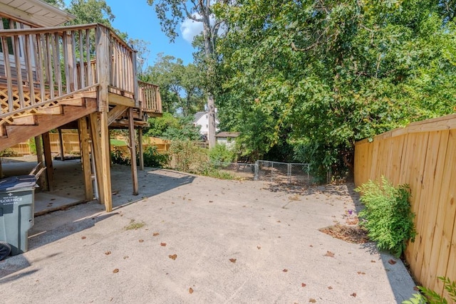 view of yard featuring a wooden deck