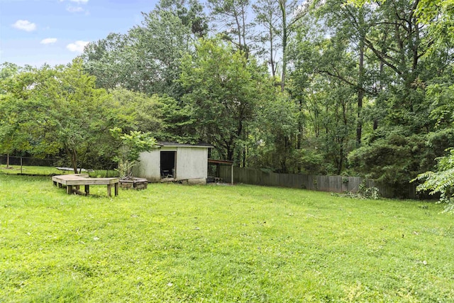  - view of yard with a storage unit