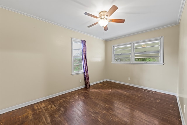  - unfurnished room featuring crown molding, wood finished floors, and ceiling fan