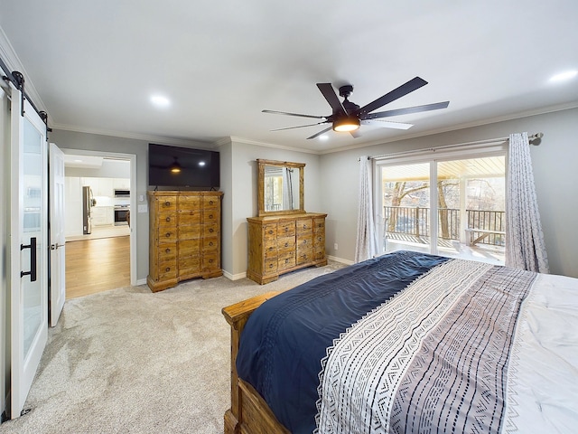 bedroom with light colored carpet, a barn door, ornamental molding, access to outside, and baseboards