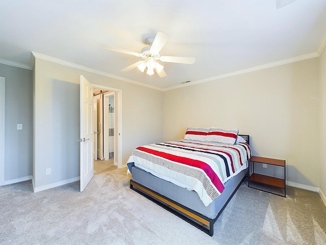 bedroom with crown molding, carpet flooring, visible vents, and baseboards