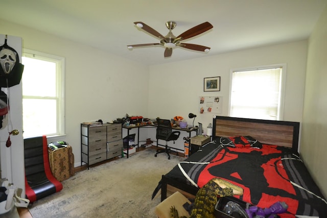 carpeted bedroom featuring ceiling fan