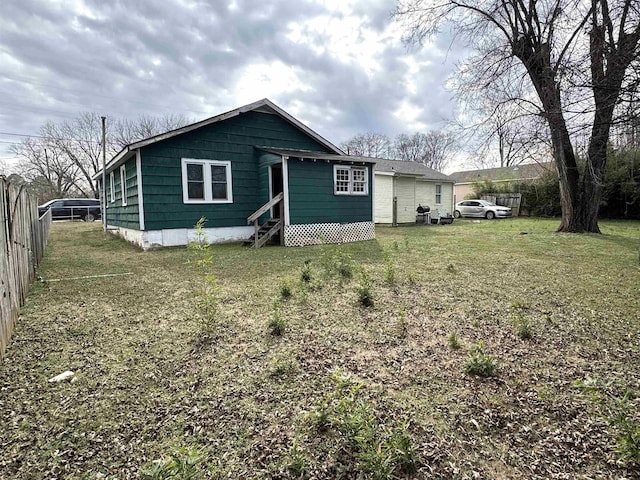 exterior space featuring a lawn