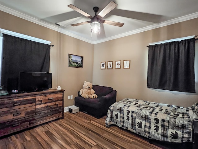 bedroom featuring ceiling fan, crown molding, and hardwood / wood-style flooring
