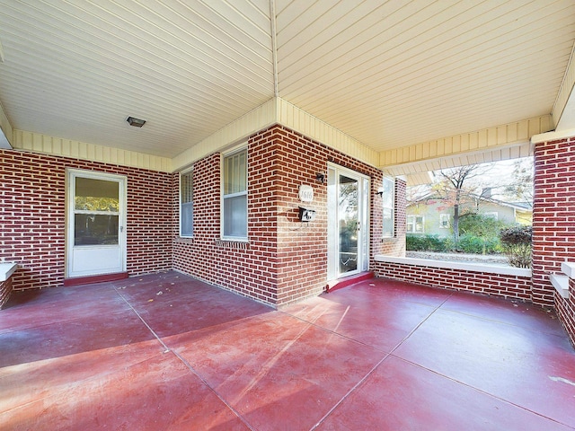 view of patio featuring a porch