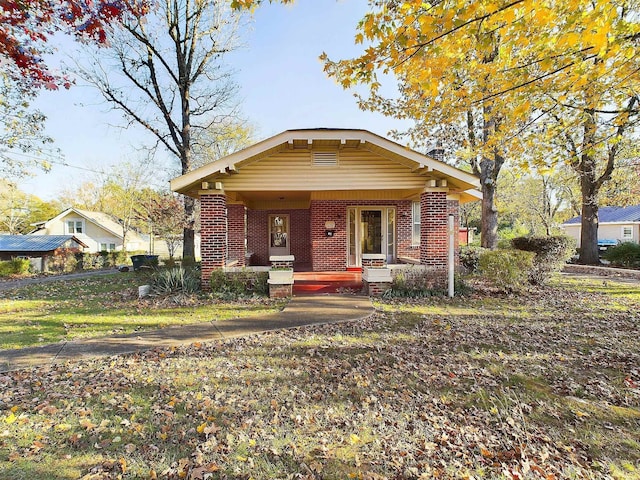 bungalow-style home with a porch