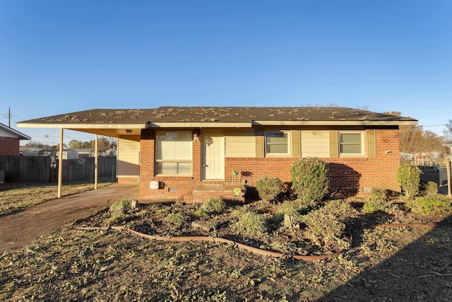 view of front of house featuring a carport