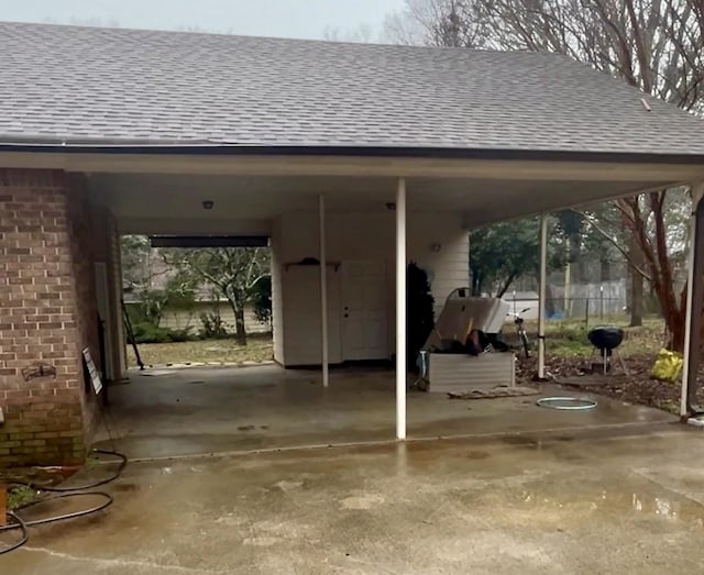 view of parking / parking lot with a carport