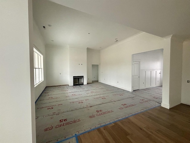 unfurnished living room featuring hardwood / wood-style floors