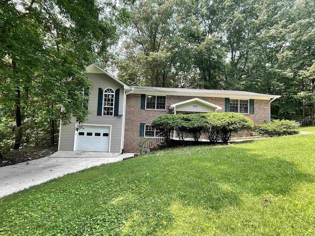 - view of front of home featuring driveway, a garage, a front lawn, and brick siding