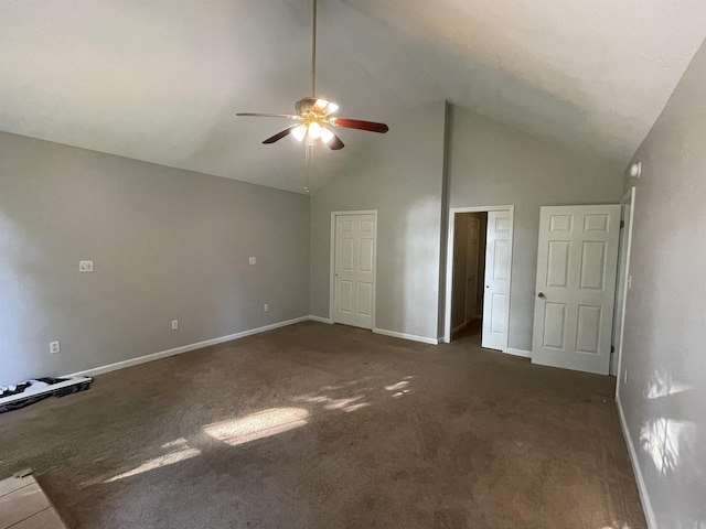  - unfurnished bedroom featuring high vaulted ceiling, carpet flooring, baseboards, and ceiling fan