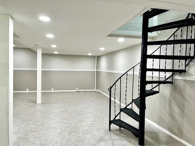  - stairway featuring baseboards and recessed lighting