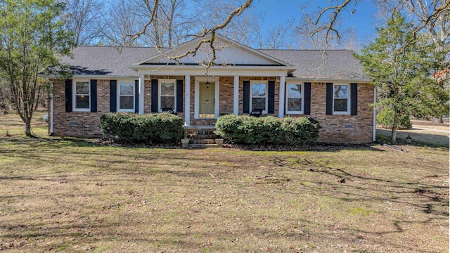 single story home with a front lawn