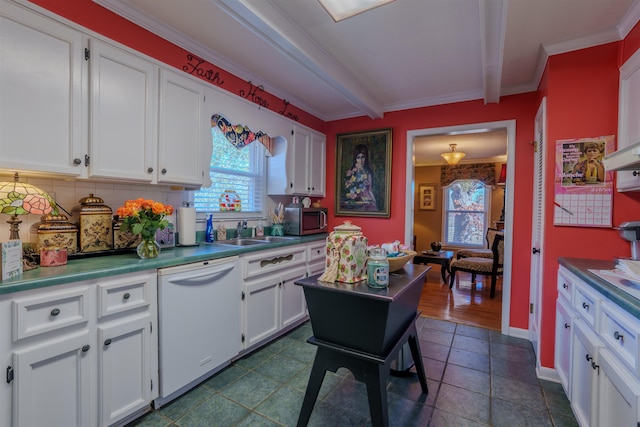 kitchen featuring white cabinetry, white dishwasher, backsplash, and sink