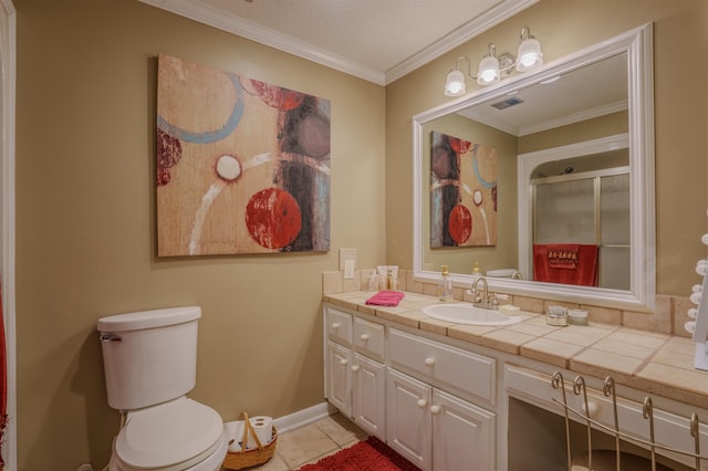 bathroom with tile patterned flooring, toilet, walk in shower, crown molding, and vanity