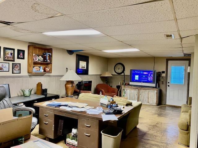 office with a paneled ceiling