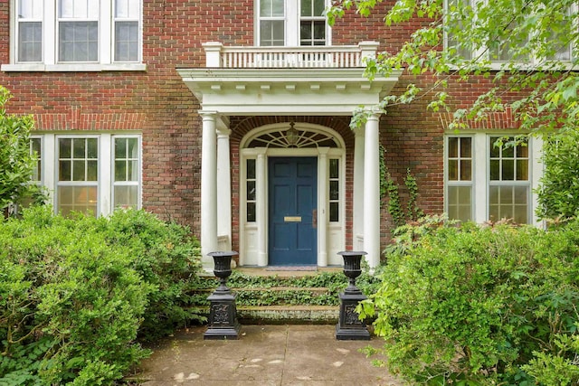 doorway to property with a balcony