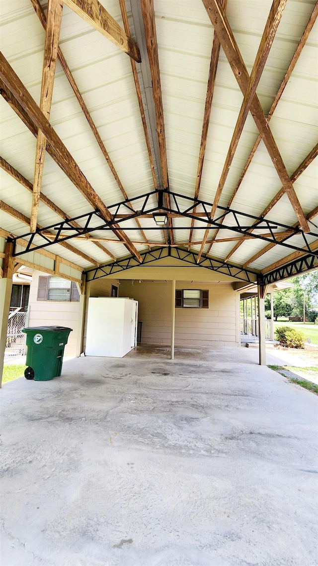 garage featuring a carport