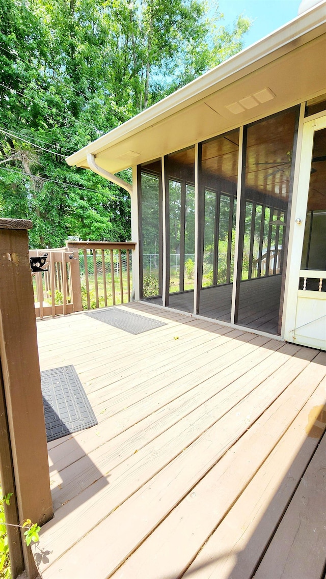 deck featuring a sunroom