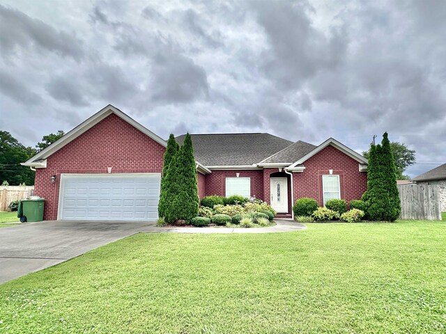 - view of front of house featuring brick siding, concrete driveway, an attached garage, and roof with shingles