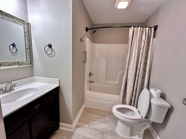  - bathroom featuring toilet, shower / bathtub combination with curtain, vanity, and baseboards
